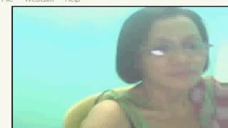 Chinesa madura e amadora perante a camera